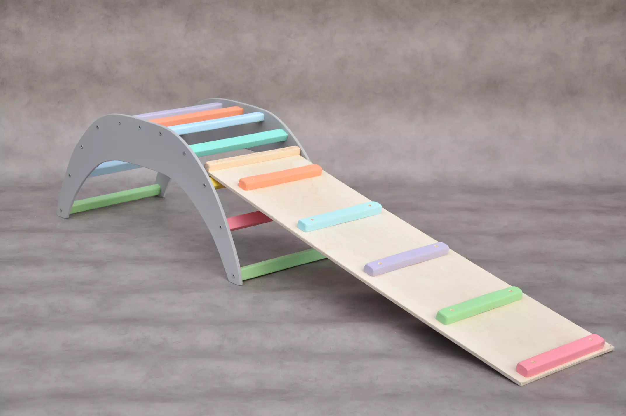 Climbing arch and rocker Barin Toys Montessori climber to tire out 1 - 2 year old toddler indoors.