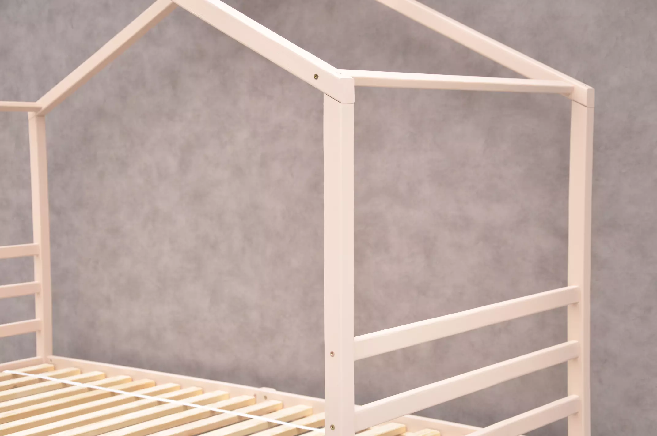 Children's house bed Riga Barin Toys brand design wooden single bed 90x200 cm details in close view.