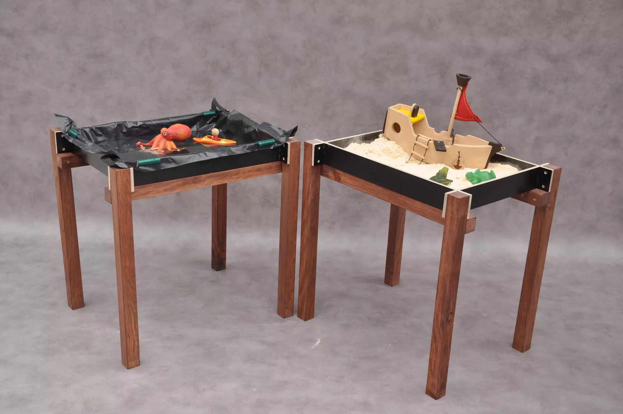 Water table and sandpit table outdoor toys play set for sensory games in the garden and backyard.