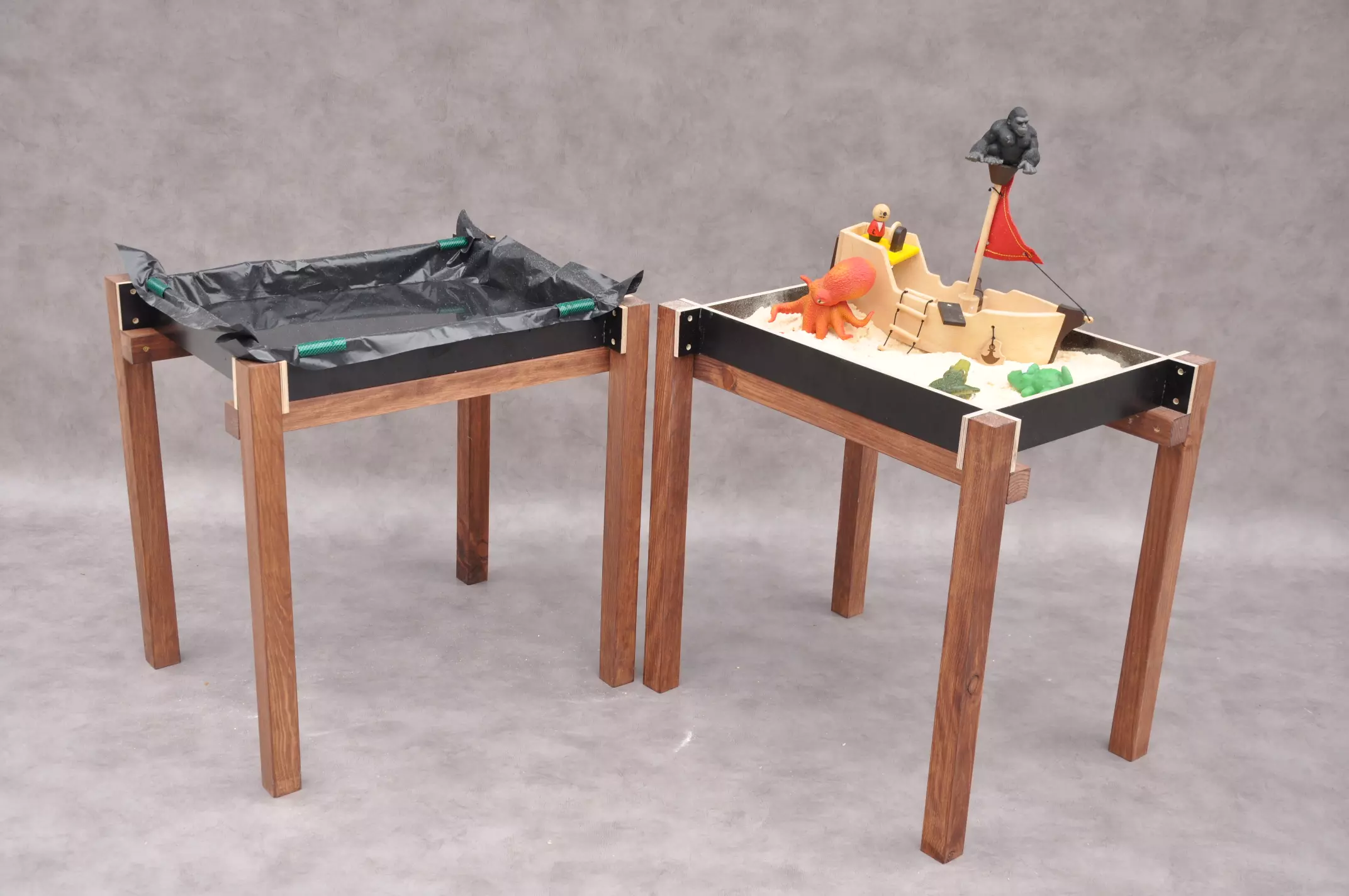 Sand and water table children's toys for garden and backyard outdoor play.