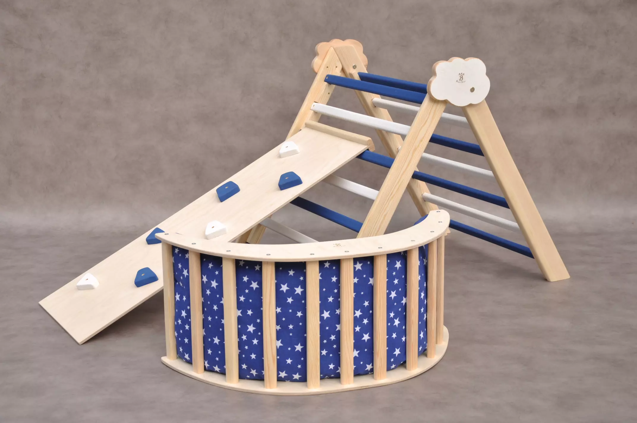 Montessori wooden toys - Pikler triangle & baby arch by Barin Toys - Nautical Cloud baby climber gym and climbing arch with a pillow. Hand selected unfinished wooden climbing frame with navy blue and white color steps.