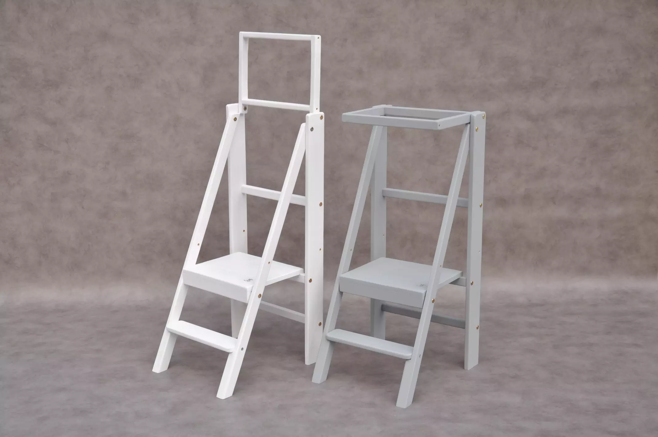 Barin Toys Slim learning tower selection: classic white toddler tower or modern grey kitchen helper.